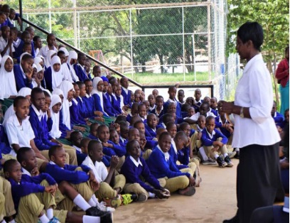 AWLAHURIO staff addressing students at a school visit